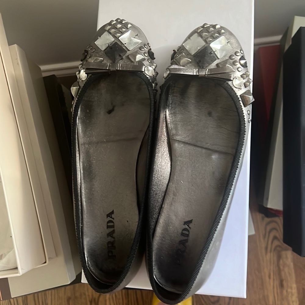 Prada silver and black trim flats with stones